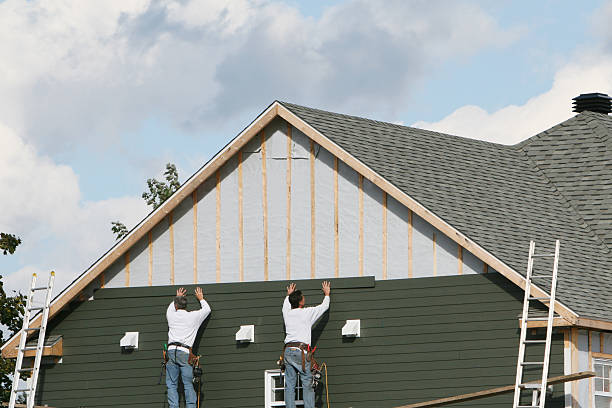 Professional Siding technician working in Warsaw, KY